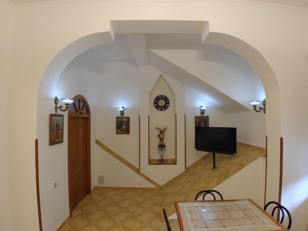 TV o dispositivi per l'intrattenimento presso Guest House Urat