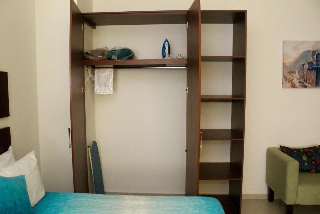 Postel nebo postele na pokoji v ubytování Casa de la iaia Hotel