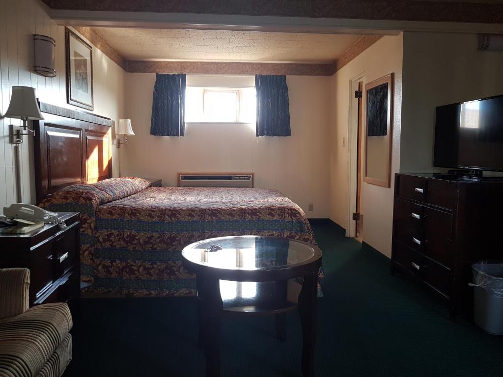 Postel nebo postele na pokoji v ubytování Townhouse Motel