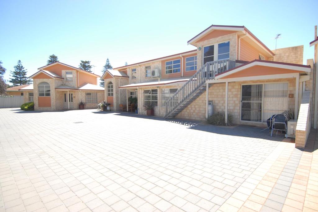 a brick driveway in front of a house at Esperance Foreshore Apartments in Esperance