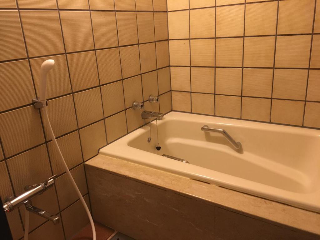 Koupelna v ubytování KKR Hotel Nagoya