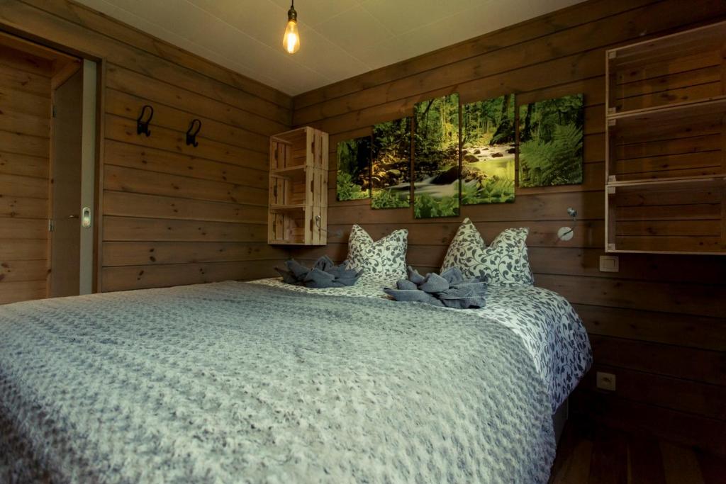 Postel nebo postele na pokoji v ubytování Chalet "A l Orée du bois"