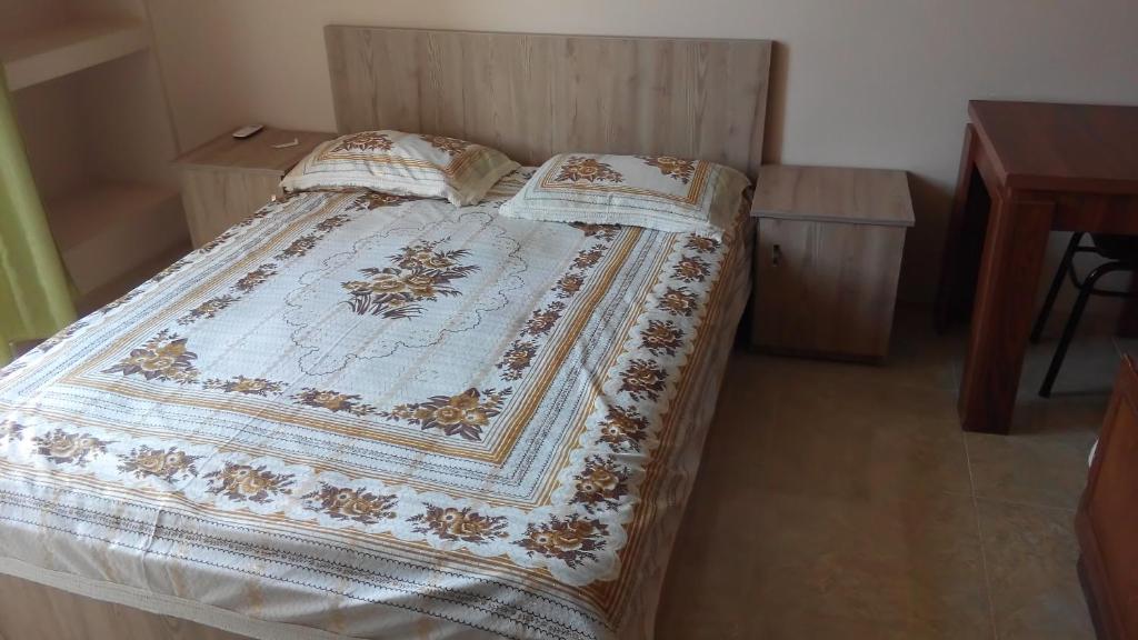 Postel nebo postele na pokoji v ubytování Guest House Vitali