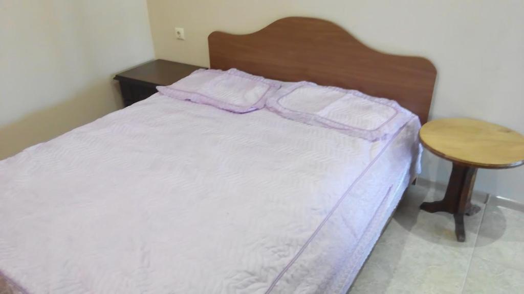 Postel nebo postele na pokoji v ubytování Guest House Vitali