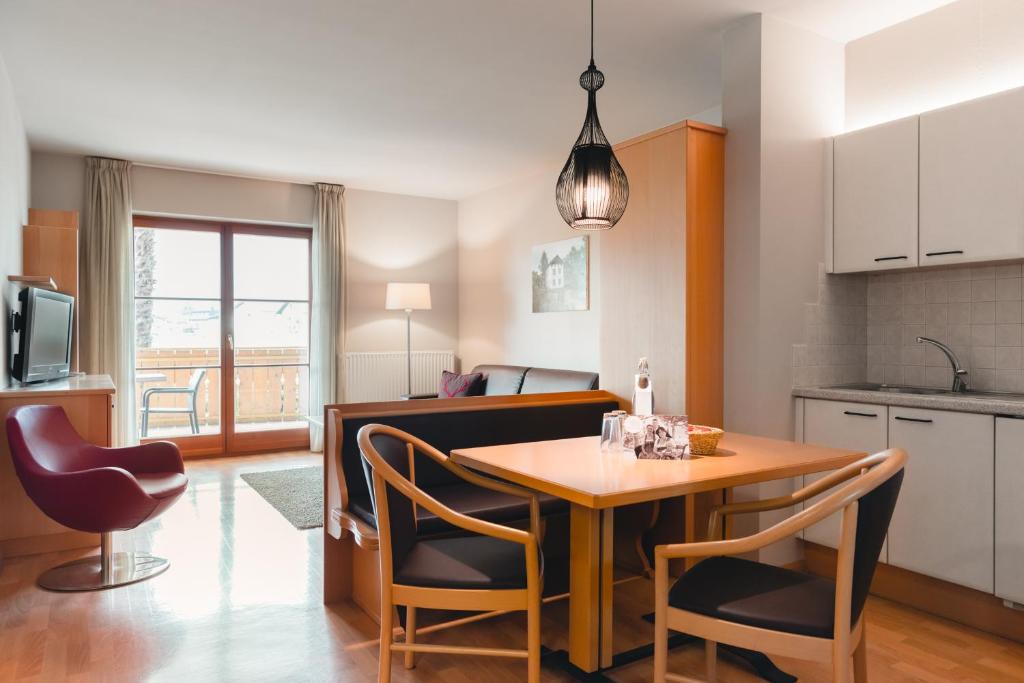 Kuchyň nebo kuchyňský kout v ubytování Hotel Tiefenbrunn Gardensuites & Breakfast