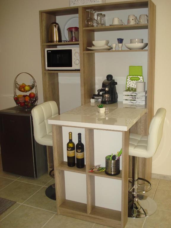 Kuchyňa alebo kuchynka v ubytovaní Eszter Apartman