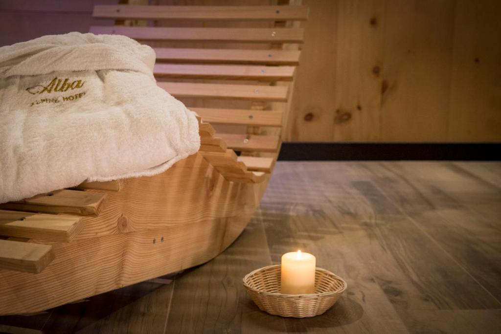 A bed or beds in a room at Hotel Alba