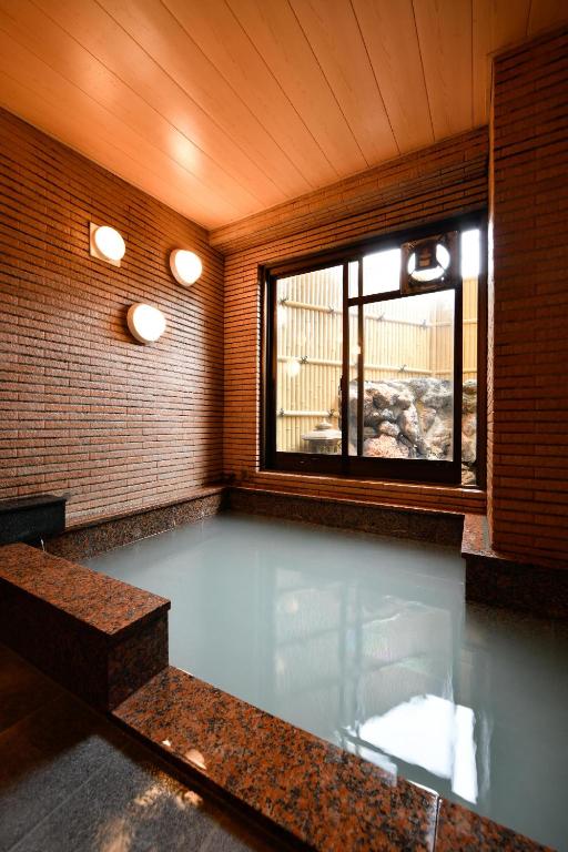 Fotografie z fotogalerie ubytování Ryokan Tamura v destinaci Kusacu
