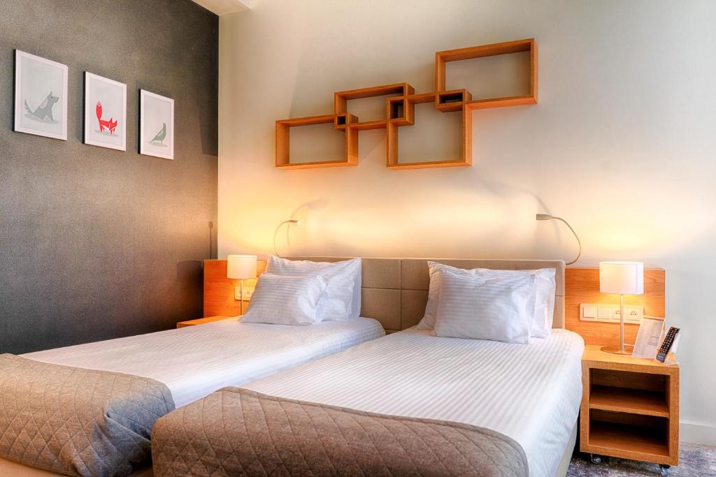 Łóżko lub łóżka w pokoju w obiekcie Focus Hotel Premium Sopot