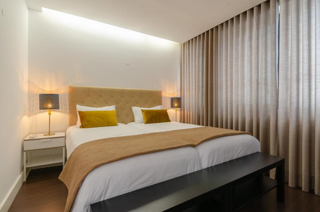 Postel nebo postele na pokoji v ubytování Lisbon Avenue Marquês - Luxury Apart