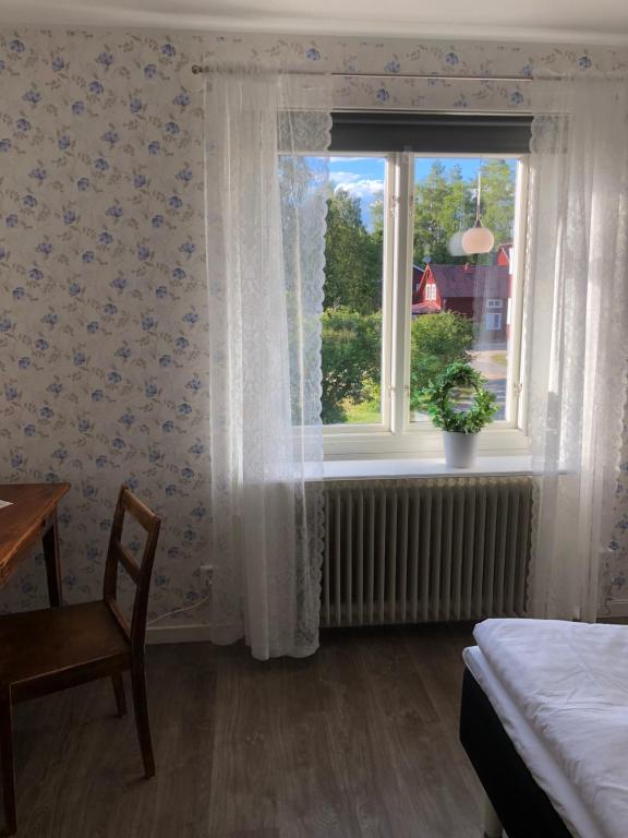 Postel nebo postele na pokoji v ubytování Helsingegården