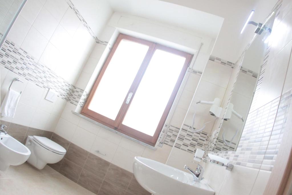 Koupelna v ubytování A'MANTIA HOTEL