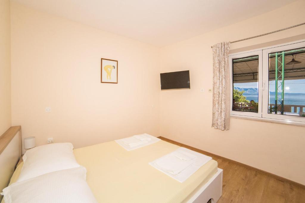 TV a/nebo společenská místnost v ubytování Apartment Cvita