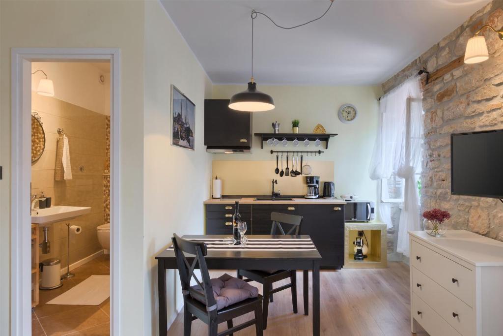 Kuchyň nebo kuchyňský kout v ubytování Luxury Apartment Fabris