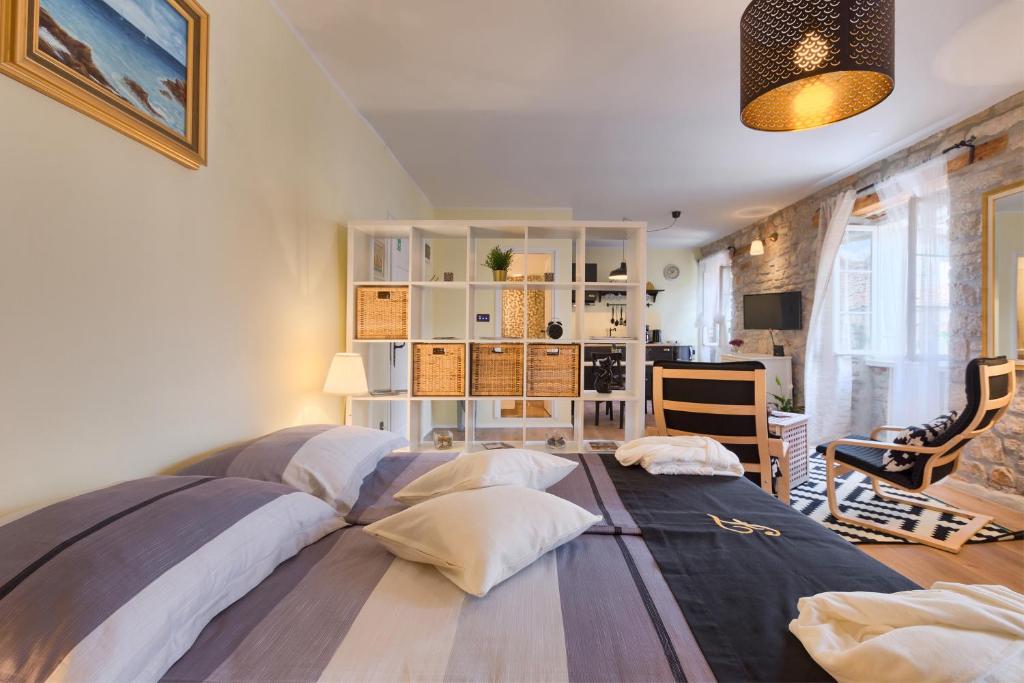 Postel nebo postele na pokoji v ubytování Luxury Apartment Fabris