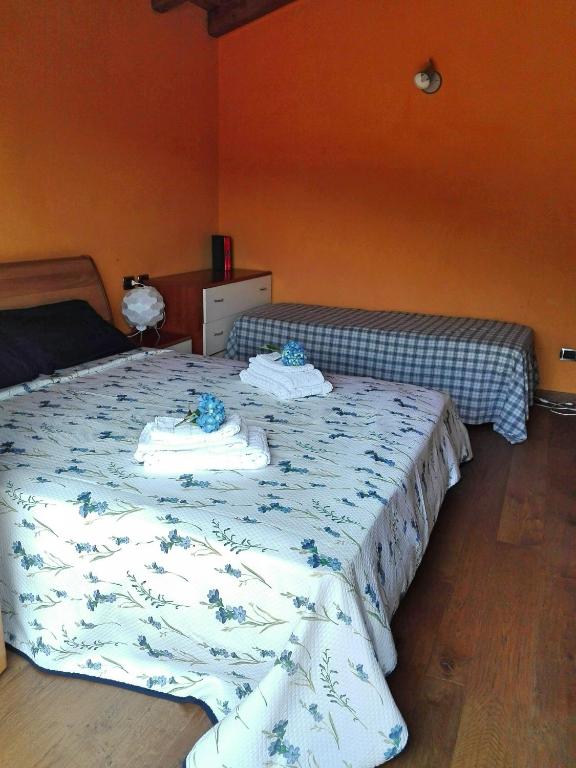 Postel nebo postele na pokoji v ubytování B&B Villa Claudia