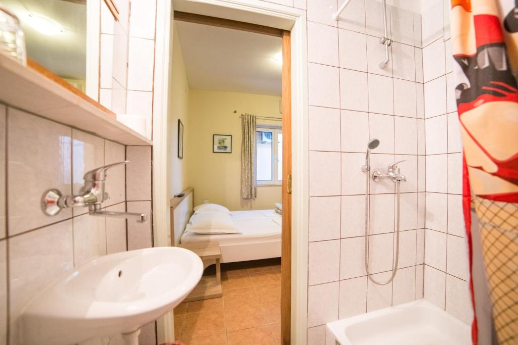 Koupelna v ubytování Apartment Cvita