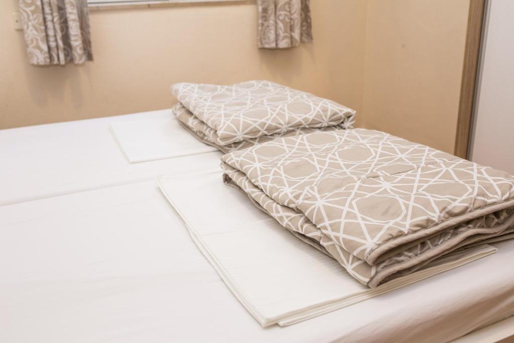 Postel nebo postele na pokoji v ubytování Apartment Cvita