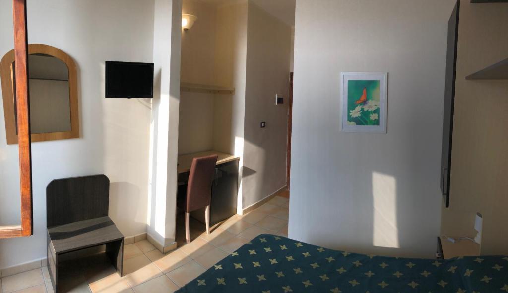 TV a/nebo společenská místnost v ubytování Hotel Normanni