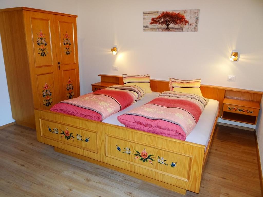 Postel nebo postele na pokoji v ubytování Hochwieserhof