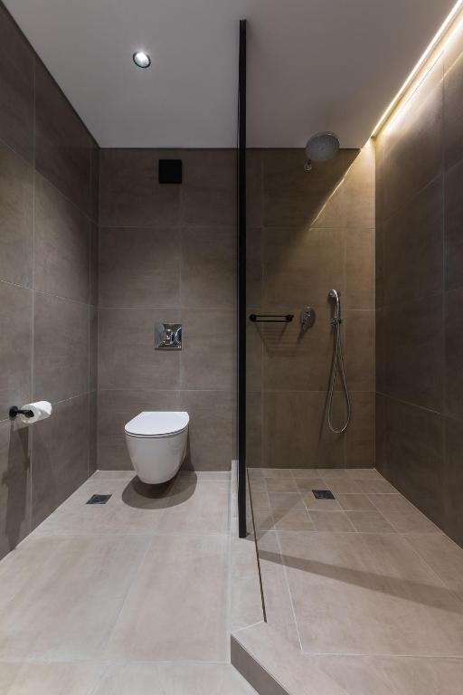 Koupelna v ubytování Klepsydra Urban Suites
