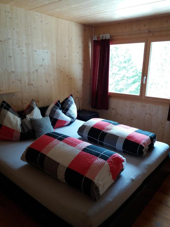 Postel nebo postele na pokoji v ubytování Jelmon Anstalt Restaurants Schneeflucht