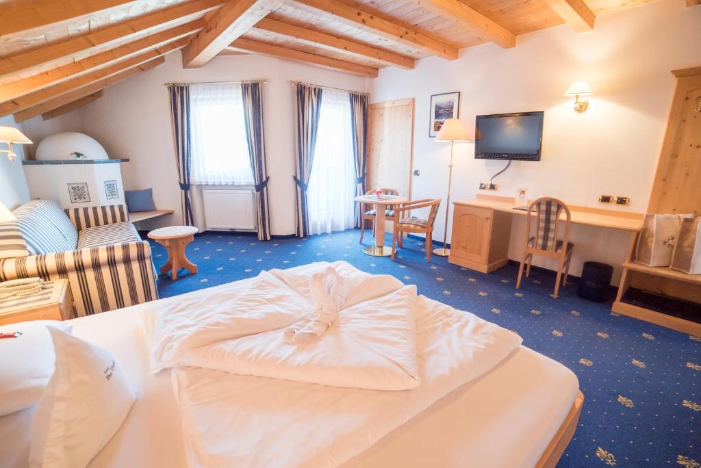 Postel nebo postele na pokoji v ubytování Hotel Pra Tlusel