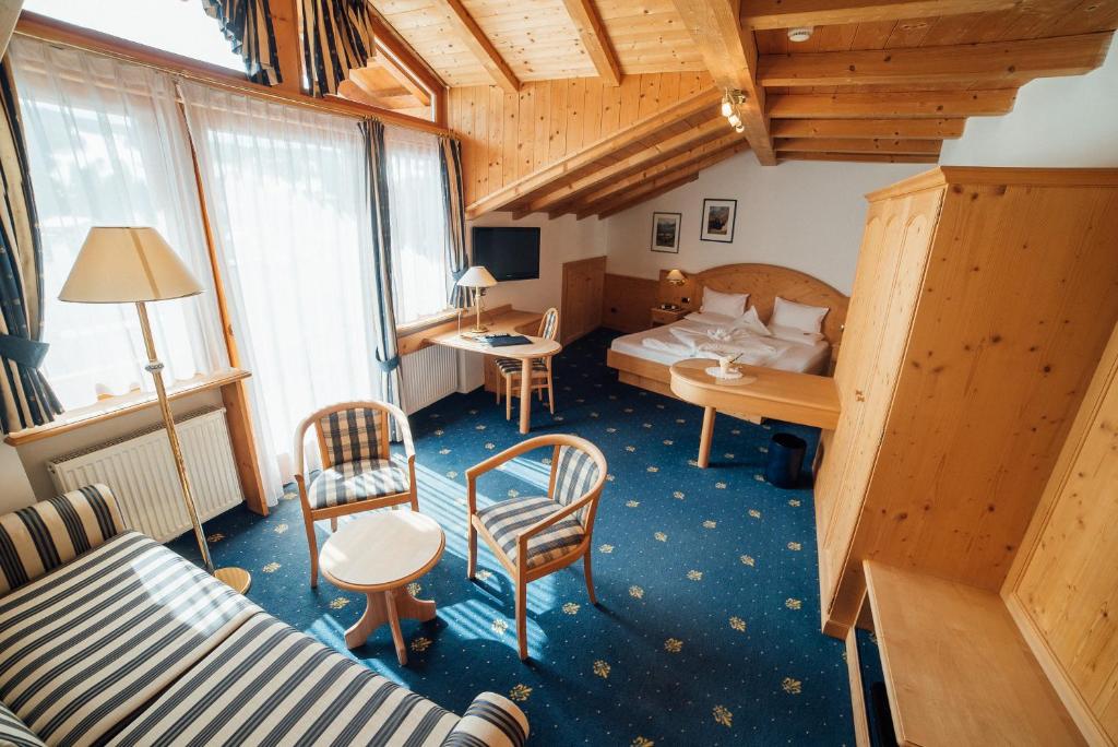Postel nebo postele na pokoji v ubytování Hotel Pra Tlusel