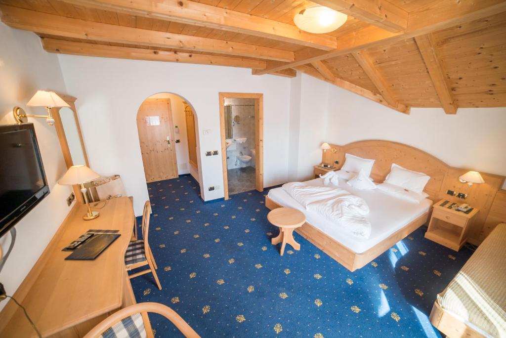 Postel nebo postele na pokoji v ubytování Hotel Pra Tlusel