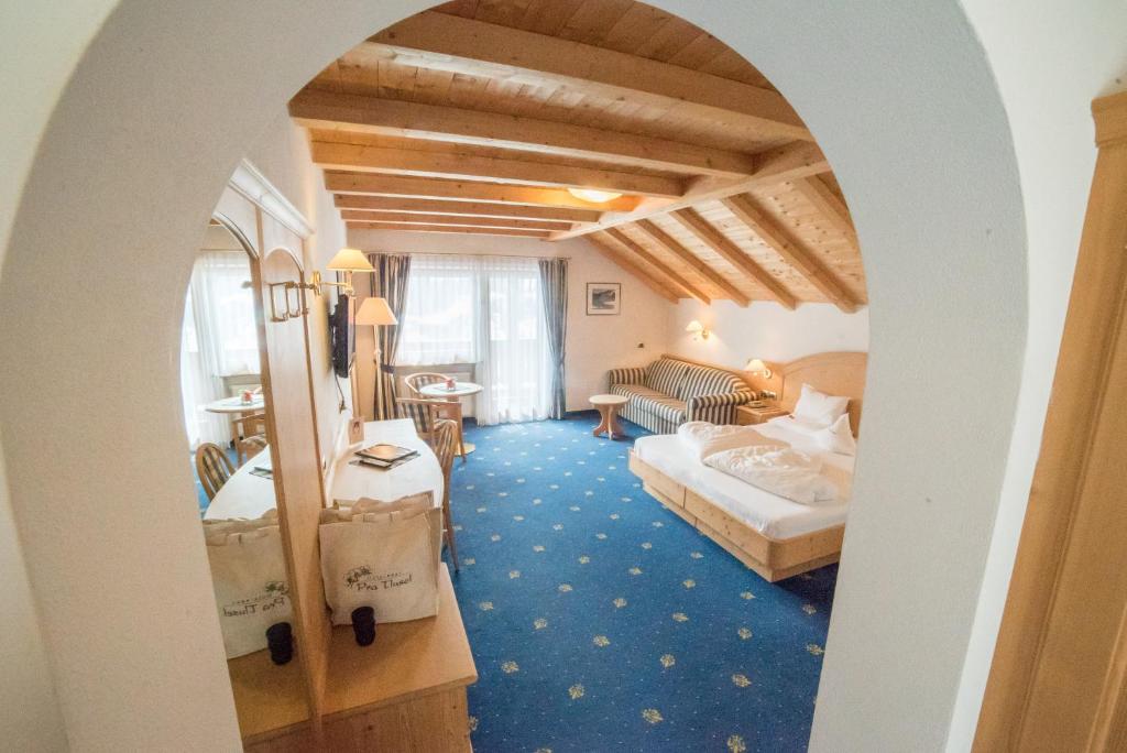 Postel nebo postele na pokoji v ubytování Hotel Pra Tlusel