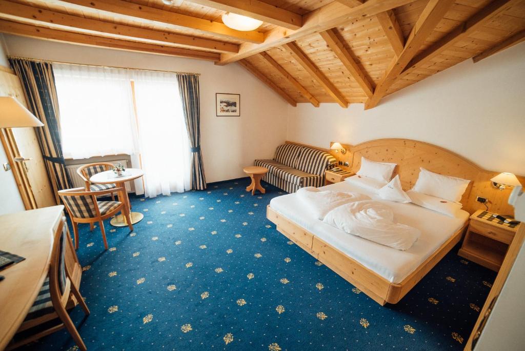 Postel nebo postele na pokoji v ubytování Hotel Pra Tlusel