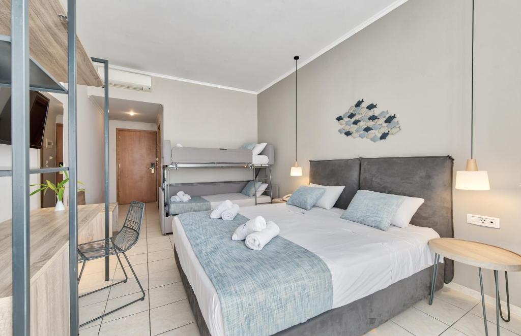 Vuode tai vuoteita majoituspaikassa Contessa Hotel