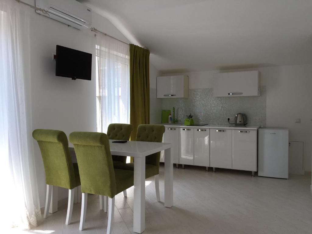 Kuchyň nebo kuchyňský kout v ubytování Guest House