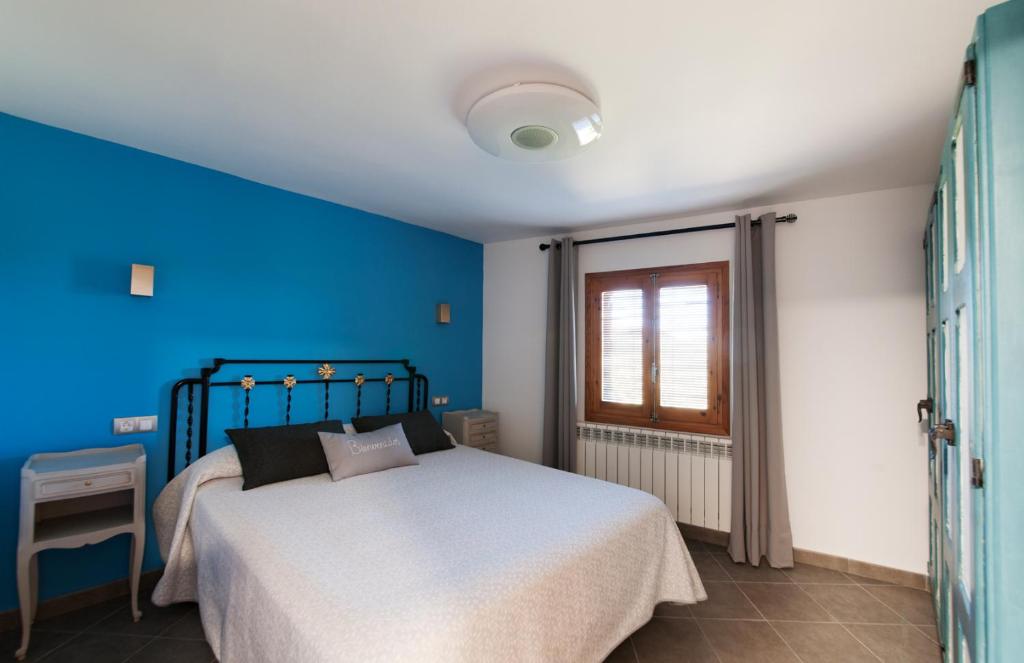 Łóżko lub łóżka w pokoju w obiekcie Casa Dominica