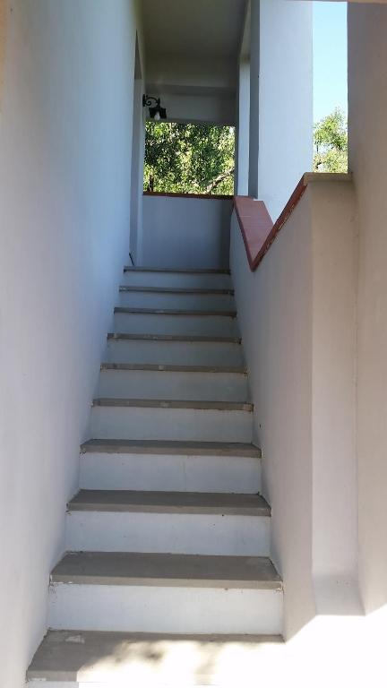 a staircase leading up to a building with a window at La Torretta in Lerici