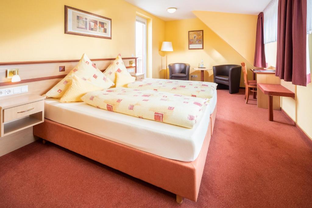 Postel nebo postele na pokoji v ubytování Hotel Atlantis