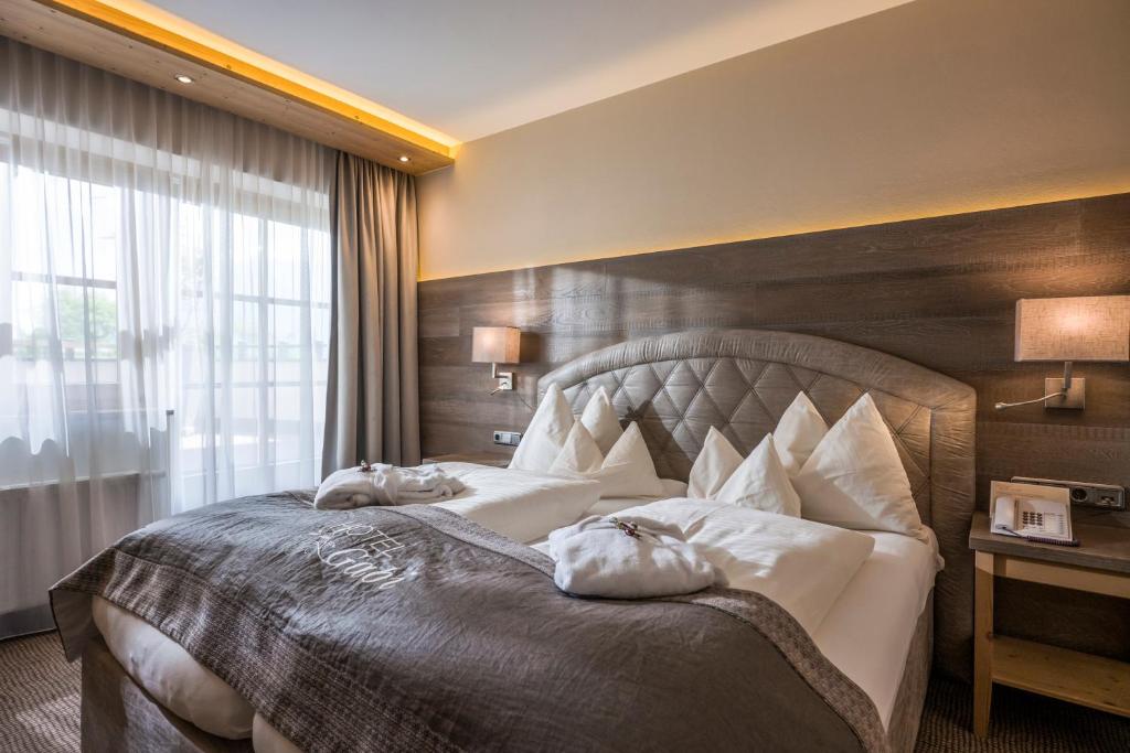 Posteľ alebo postele v izbe v ubytovaní Hotel Gabi