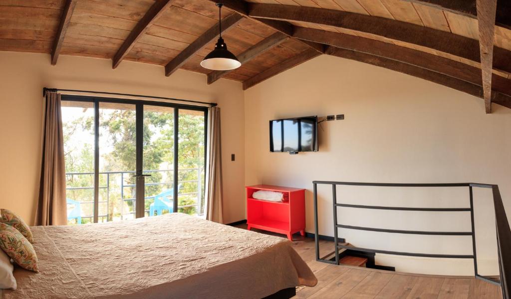 Postel nebo postele na pokoji v ubytování Villa Calas