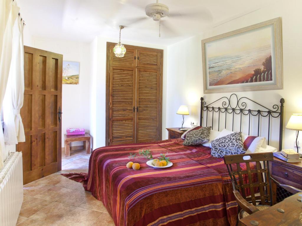 Posteľ alebo postele v izbe v ubytovaní Hotel Rural Molino del Puente Ronda