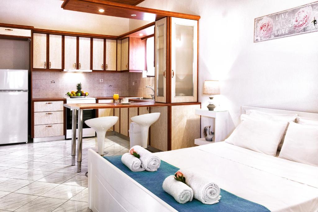 Kuchyň nebo kuchyňský kout v ubytování Del Sol Suites