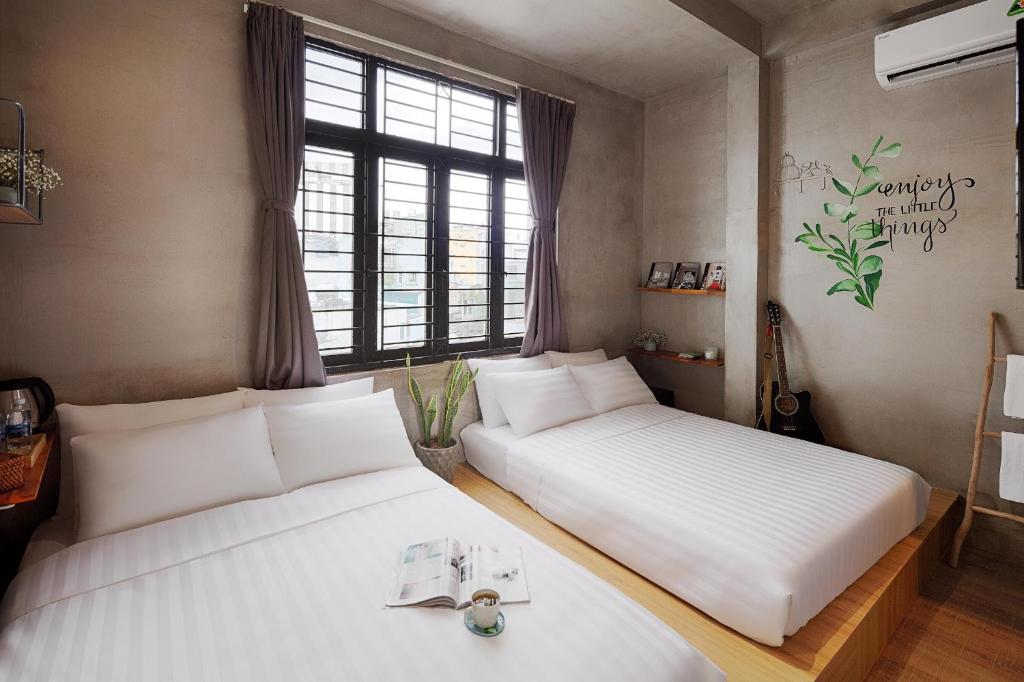 Ένα ή περισσότερα κρεβάτια σε δωμάτιο στο 9 Hostel and Bar