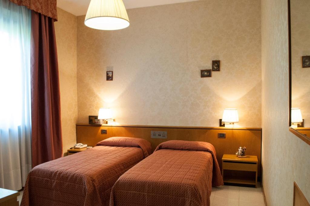 Postel nebo postele na pokoji v ubytování Le Gronde