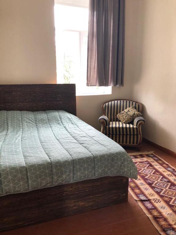 Postel nebo postele na pokoji v ubytování Acacia guest house
