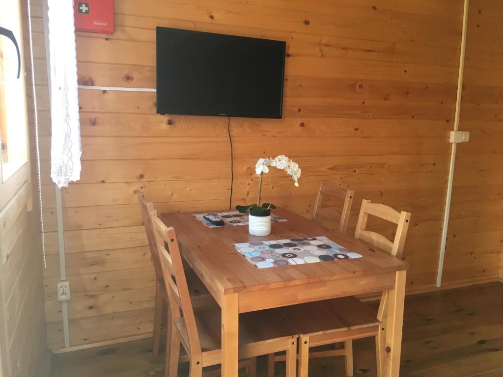 TV a/nebo společenská místnost v ubytování Kayman