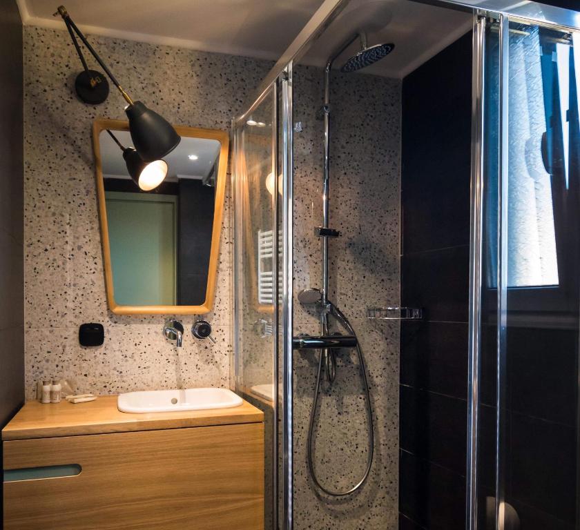 Kúpeľňa v ubytovaní Allure Central Boutique Hotel