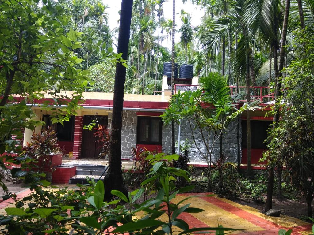 a house in the middle of a forest at Nivaant @ Vicharays in Alibaug