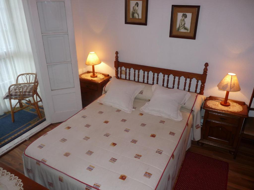 A bed or beds in a room at Hospedaje Roiz