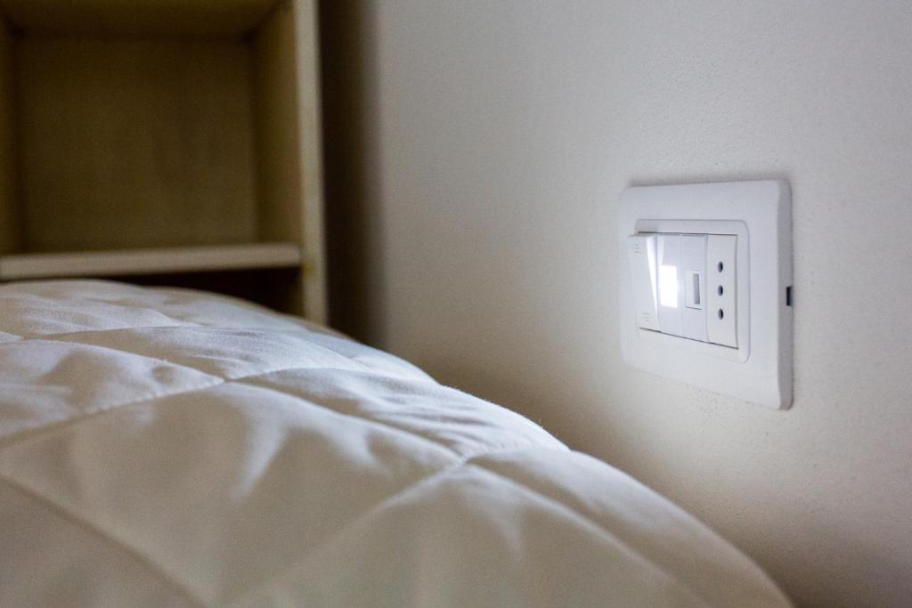 Postel nebo postele na pokoji v ubytování Student's Hostel Estense