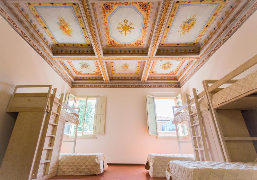 Postel nebo postele na pokoji v ubytování Student's Hostel Estense