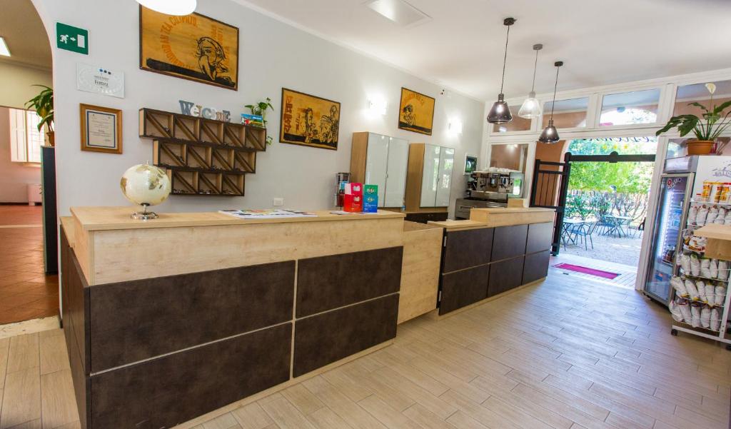 Kuchyň nebo kuchyňský kout v ubytování Student's Hostel Estense